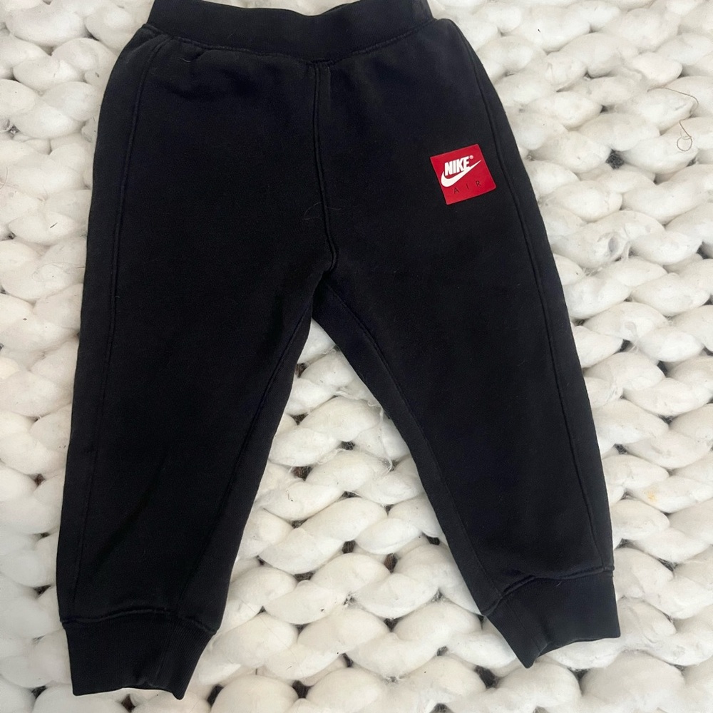 Nike Kids Black Sweatpants with Red Logo
